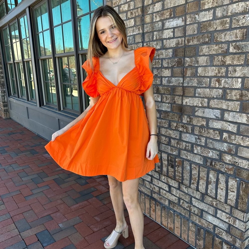 Perfect dress for game days and summer/spring events. Size small by day & moon.